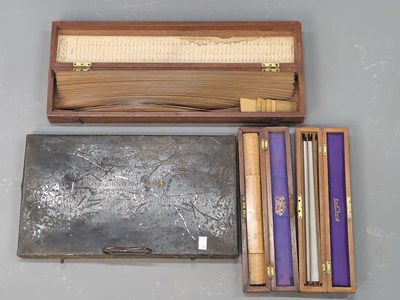 Lot 1337 - A mahogany case of wooden graded curves, two...