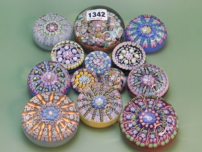 Lot 1342 - A collection of thirteen millefiore glass...