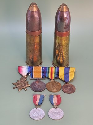 Lot 1364 - A WWI four medal group to include a Battle of...