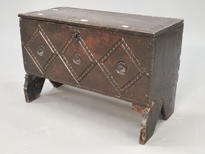 Lot 1365 - A 17th century oak coffer with the front...