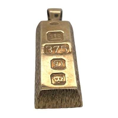 Lot 1122 - A 9ct hallmarked gold ingot pendant 28.1g