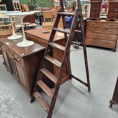 Lot 289 - A set of antique pine and brass scullery...