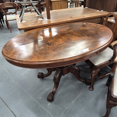 Lot 296 - A Victorian oval walnut breakfast table on a...