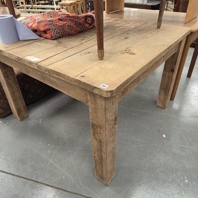 Lot 301 - A large pine scullery table on stout square...