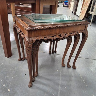 Lot 307 - A walnut nest of tables