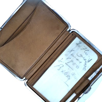 Lot 1136 - A hallmarked silver aide-memoire/card case of...