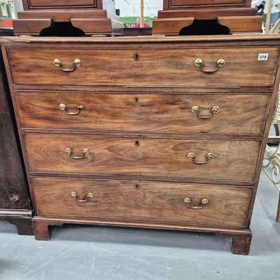 Lot 318 - A George III mahogany chest of four long...
