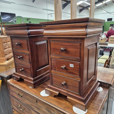 Lot 319 - A pair of three-drawer bedside chests H 66  W...