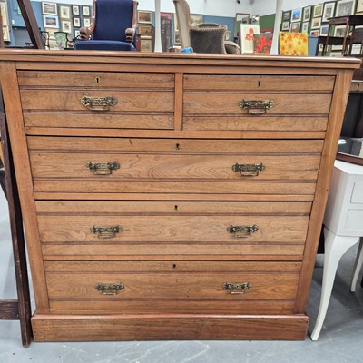 Lot 320 - A large late Victorian walnut chest of drawers...