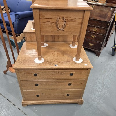 Lot 323 - A low pine chest of three drawers H 71 W 83 D...