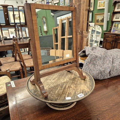 Lot 343 - An oak lazy Susan and a small swing mirror
