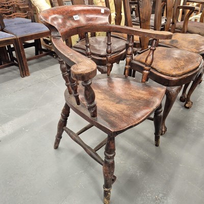 Lot 357 - An antique captain's chair