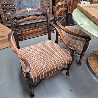 Lot 372 - A pair of low ladder back armchairs