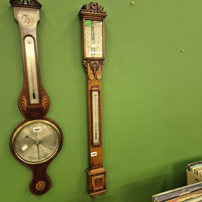 Lot 385 - A Victorian oak stick barometer