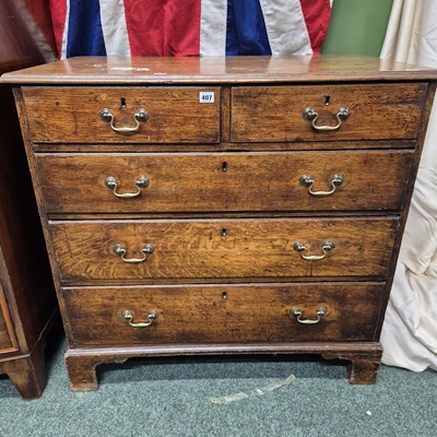 Lot 407 - A late 18th century oak chest of drawers on...