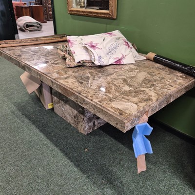 Lot 414 - A large marble dining table on pedestal...