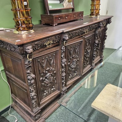 Lot 430 - An impressive large carved oak four door side...
