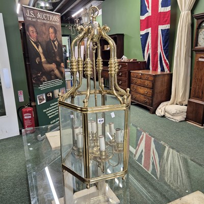 Lot 434 - A large brass-framed bevelled glass hall lantern