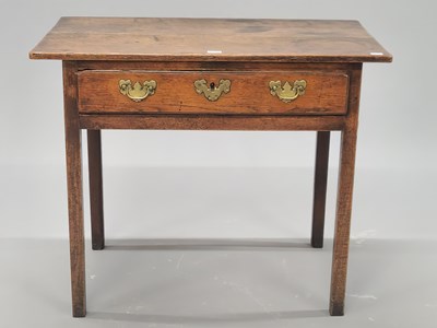 Lot 1370 - An 18th century oak table with a single drawer...