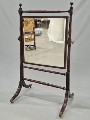 Lot 1372 - A late Victorian mahogany cheval mirror, the...