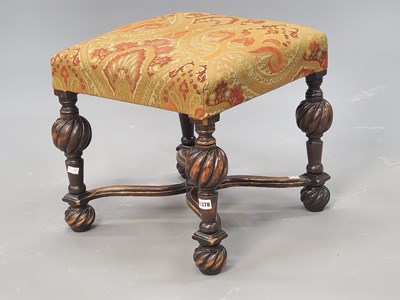 Lot 1378 - A 19th century oak stool, the four legs with...