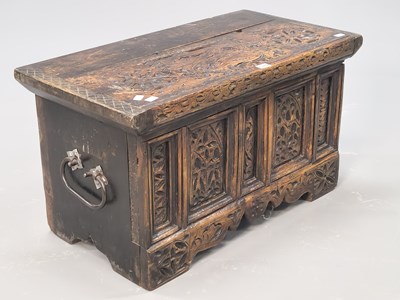Lot 1379 - An 18th century iron handled oak coffer, the...