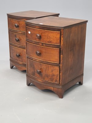 Lot 1389 - A pair of mahogany bow front bedside chests,...