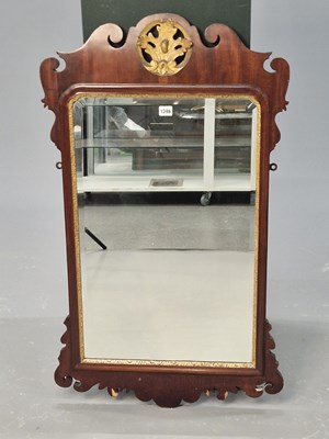 Lot 1396 - A 19th century mahogany cut framed mirror...