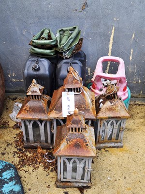 Lot 446 - A group of four metal lanterns, four army...