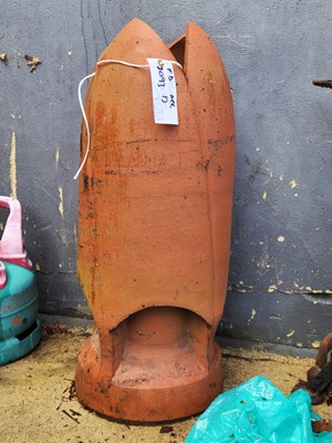 Lot 447 - A terracotta chimney top of leaf design