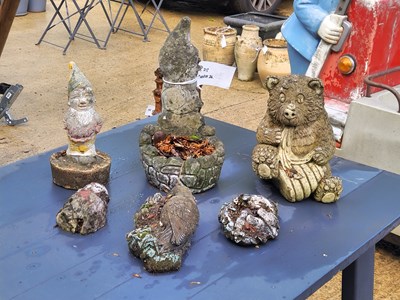 Lot 458 - A group of garden figures including a gnome,...