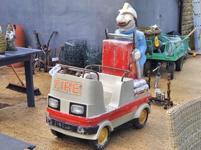Lot 459 - An old fairground ride fire truck depicting a...