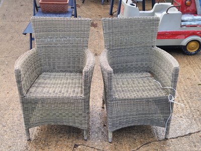 Lot 461 - A pair of rattan garden chairs