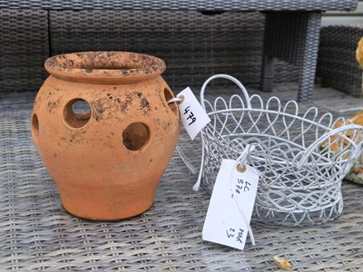 Lot 479 - Two terracotta strawberry pots, a terracotta...