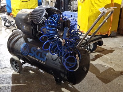 Lot 483 - An SGS petrol air compressor with hoses