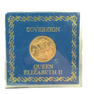 Lot 1160 - A 22ct gold QEII full sovereign contained in a...
