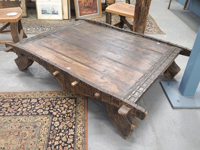 Lot 1429 - An Indian hardwood coffee table applied with...