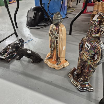 Lot 859 - Three cast-iron fireside stands and a...