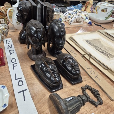 Lot 886 - Carved African hardwood bookends, four figure...
