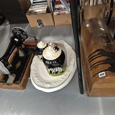 Lot 889 - A sewing machine, two cookie jars, etc.