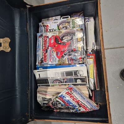 Lot 913 - A large trunk containing motorcycle magazines