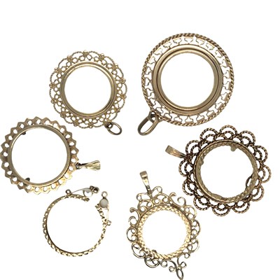 Lot 1175 - Six 9ct gold Sovereign coin pendant mounts,...