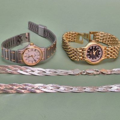 Lot 1183 - A Bulova Longchamp quartz wristwatch, a...