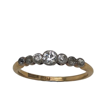 Lot 1186 - An antique 18ct gold seven-stone old cut...
