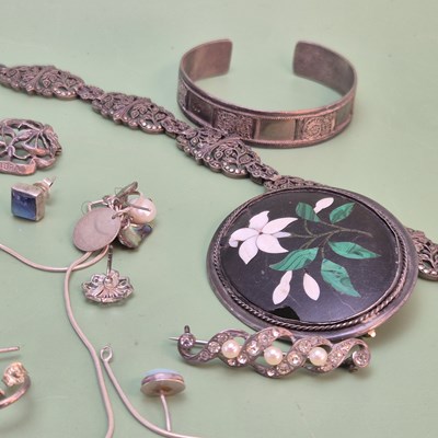 Lot 1191 - A silver and marcasite set panel bracelet...