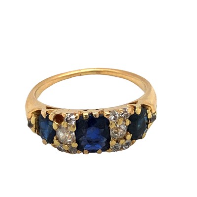Lot 1196 - An 18ct unhallmarked gold sapphire and diamond...