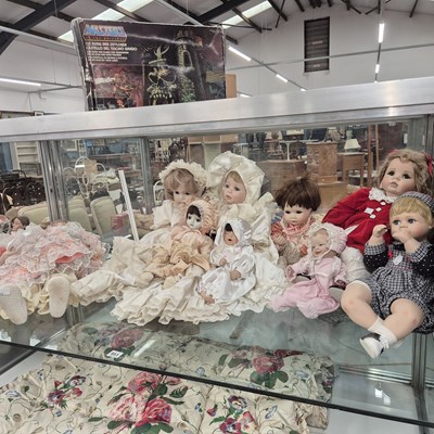 Lot 951 - A group of ten modern bisque head dolls