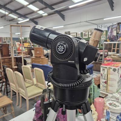 Lot 957 - A Meade telescope on a tripod