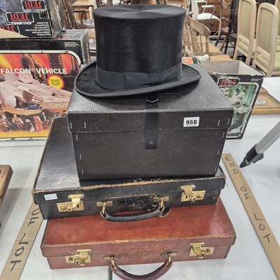 Lot 958 - Two vintage briefcases and a top hat, the top...