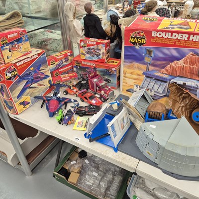 Lot 978 - A collection of vintage MASK transforming toys
